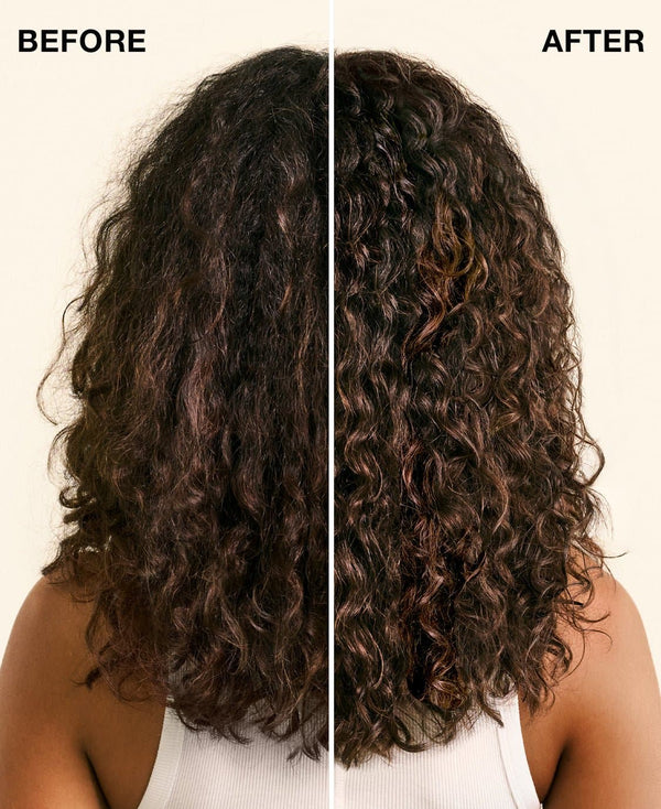 a woman with long curly hair