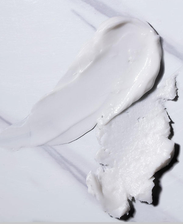a white smear of face cream