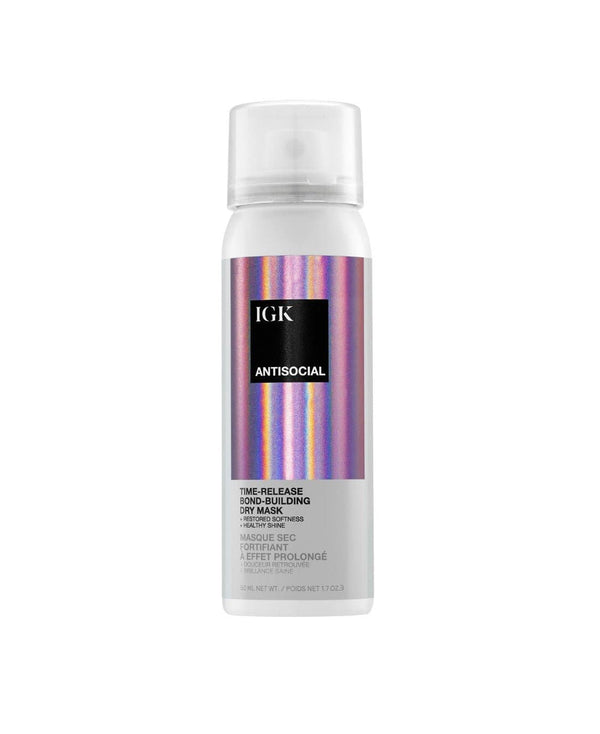 IGK Antisocial hair mask spray with a reflective, iridescent label.