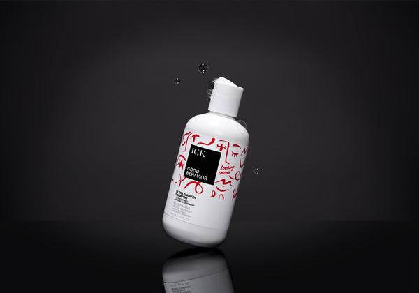 a white bottle with red and white design